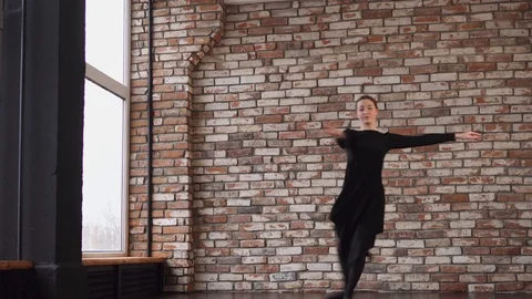 Beautiful female dancer in a nice studio Stock Footage 86319396