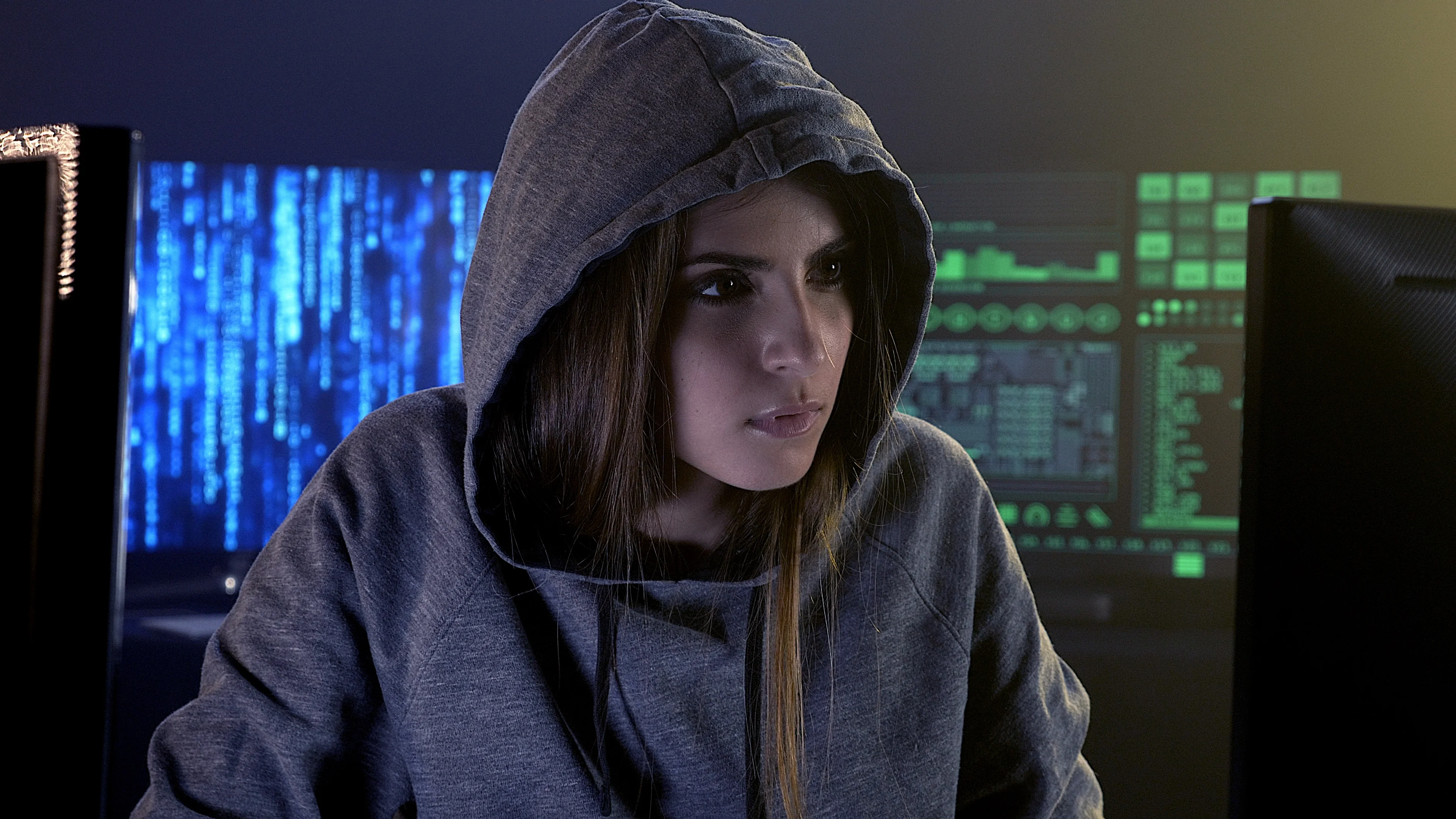 A female hacker in action using the co, Stock Video