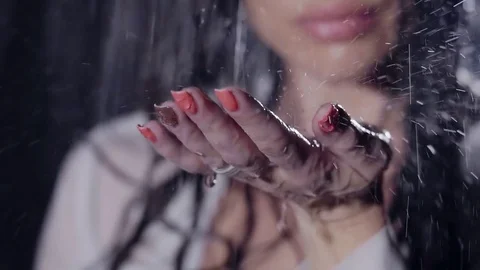 Beautiful female hand with long fingers and high-quality manicure stretches and Stock Footage