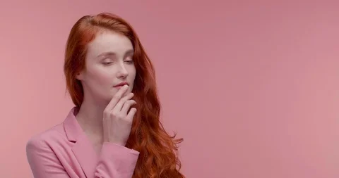 Beautiful female Model posing on Camera, standing in the Foreground. Видео 126219380