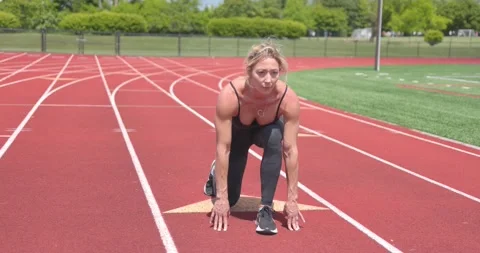 Beautiful Female Physical Trainer Working Out Exercising Running on Track Vidéo 154384598