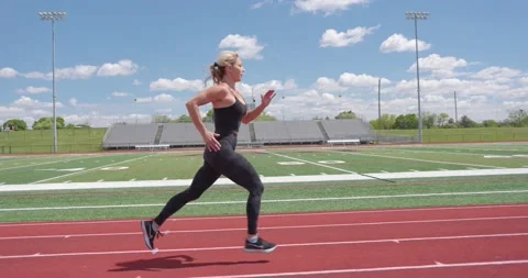 Beautiful Female Physical Trainer Working Out Exercising Running on Track 스톡 동영상 154384607