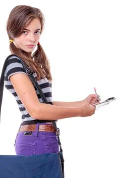 Beautiful female student with note pad, isolated on white Stock Photos