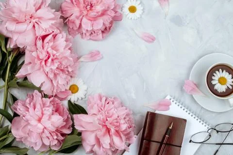 Beautiful feminine flat lay mockup with pink peonies, various stationery and  Stock Photos