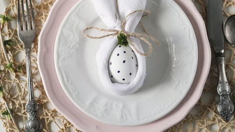 Beautiful festive Easter table setting with napkin Easter Bunny. Easter table Stock-Footage 108325352