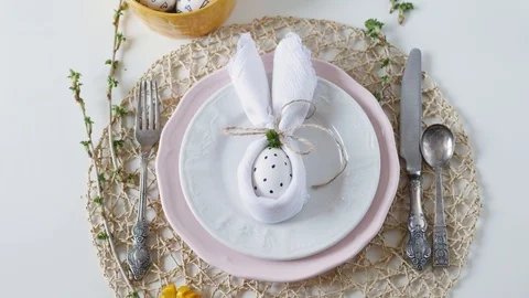 Beautiful festive Easter table setting with napkin Easter Bunny. Easter table Stock-Footage 108325675
