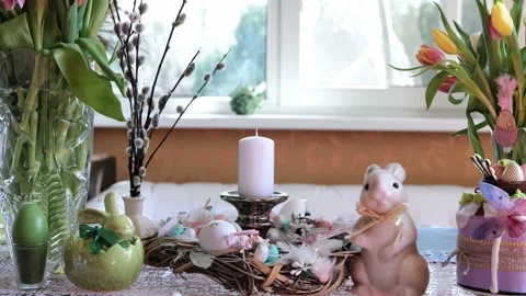 Beautiful festive served Easter table with decorations in dining room. Stock Footage 234411041