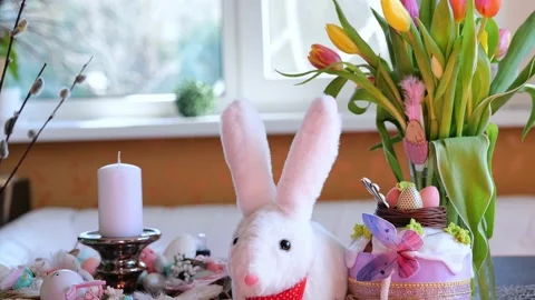 Beautiful festive served Easter table with decorations in dining room. Stock Footage 234412045