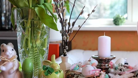 Beautiful festive served Easter table with decorations in dining room. Stock Footage 234412585