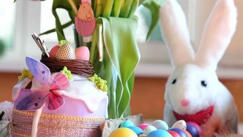 Beautiful festive served Easter table with decorations in dining room. Stock Footage 234413003