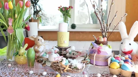Beautiful festive served Easter table with decorations in dining room. Stock Footage 234413072