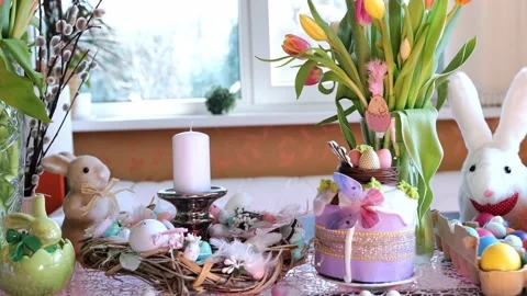 Beautiful festive served Easter table with decorations in dining room. Stock Footage 234413121
