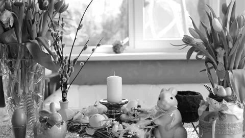 Beautiful festive served Easter table with decorations in dining room. Stock Footage 234413343