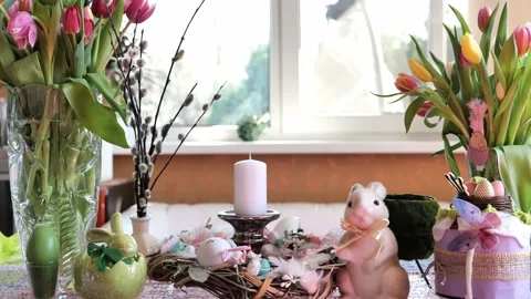 Beautiful festive served Easter table with decorations in dining room. Stock Footage 234413414