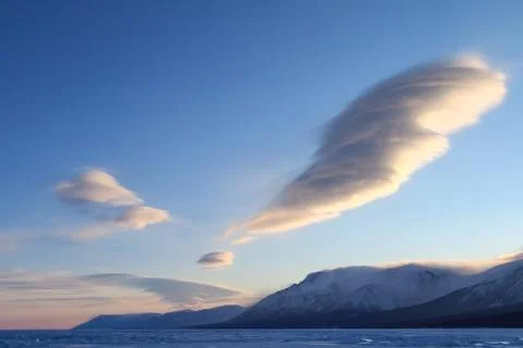 Beautiful figured clouds on sunset Stock Photos