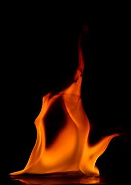 Beautiful fire flames on a black background. Stock Photos