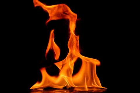Beautiful fire flames on a black background. Stock Photos