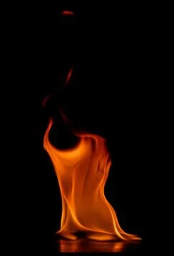 Beautiful fire flames on a black background. Stock Photos