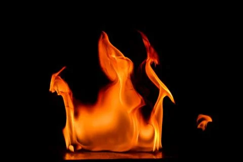 Beautiful fire flames on a black background. Stock Photos