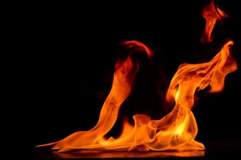Beautiful fire flames on a black background. 스톡 사진