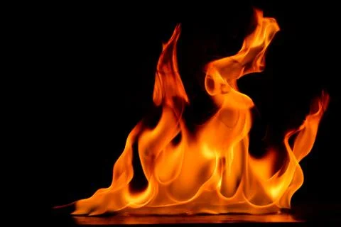 Beautiful fire flames on a black background. Stock Photos