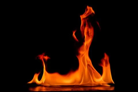 Beautiful fire flames on a black background. Stock Photos