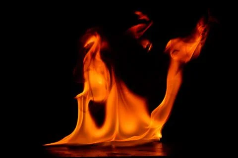 Beautiful fire flames on a black background. Stock Photos
