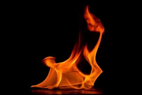 Beautiful fire flames on a black background. Stock Photos