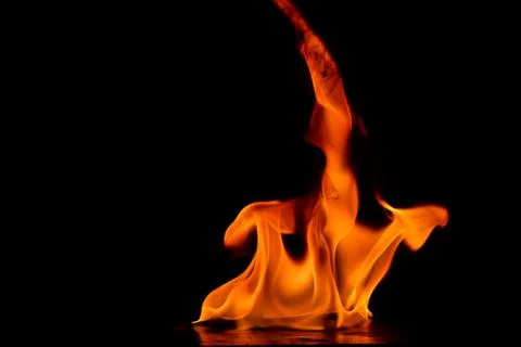 Beautiful fire flames on a black background. Stock Photos