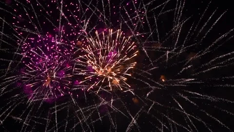 Beautiful Firework blasts in night sky Stock Footage 220732208