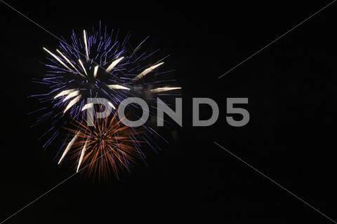 Beautiful firework of celebration, festival, holiday, season on black sky Stock Photos