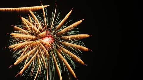 Beautiful firework display on sky at night Stock Photos