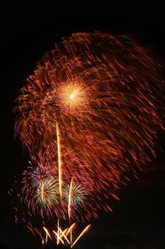 Beautiful firework display on sky at night Stock Photos