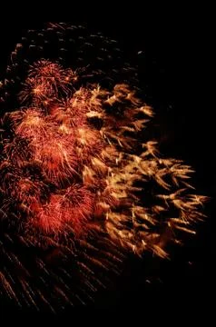 Beautiful firework display on sky at night Stock Photos