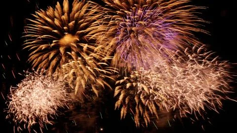 Beautiful firework display on sky at night Stock Photos