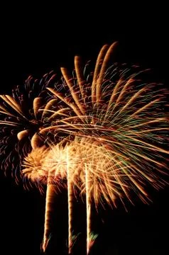 Beautiful firework display on sky at night Stock Photos