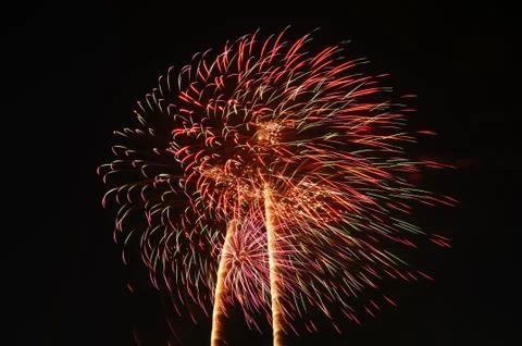 Beautiful firework display on sky at night Stock Photos