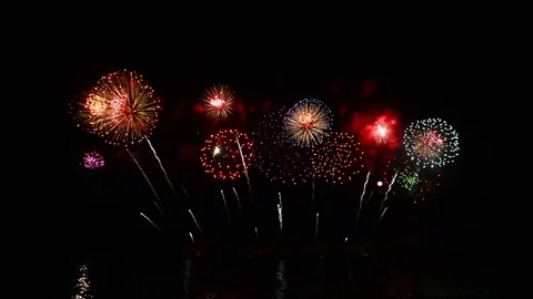 Beautiful firework reflection over the sea Stock Footage 110382380
