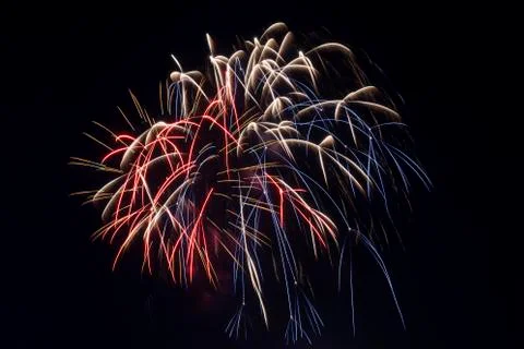 Beautiful fireworks display lights up the night time sky Stock Photos