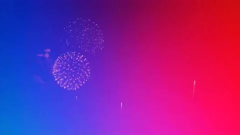 Beautiful Fireworks Explode on Colourful background In Celebration Day 4K Stock Footage 143094780