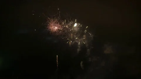 Beautiful fireworks show in the night sky Stock Footage