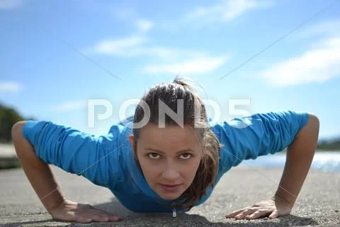 Beautiful fitness woman exercising Stock Photos