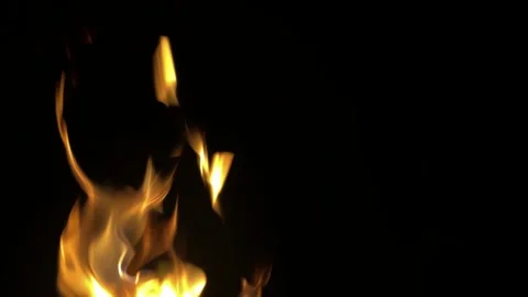 Beautiful flame on black background. Strong fire on black background. Yellow Stock Footage 313754383