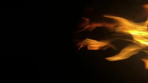 Beautiful flame on black background. Strong fire on black background. Yellow Stock Footage 316392218