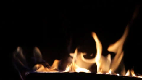 Beautiful flames on a black background in the fireplace. Stock Footage 201324098