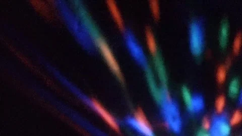 Beautiful flickering reflections from the lamp on the wall. Purple, pink, blue,  Stock Footage 327925006