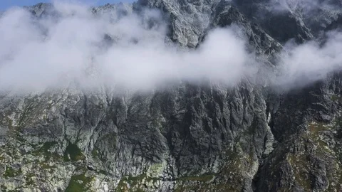 Beautiful flight with the Clouds at peaks in High Tatras Mountains in Slovakia Stock Footage 125995877