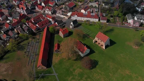 Beautiful flight over the monastery in the city of Lorsch. Stock-Footage 153661492