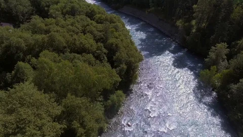Beautiful flight over a mountain river. Arkhyz. Shooting from a bird's eye view. Stock Footage 86529145