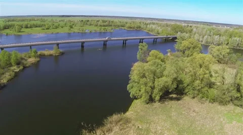 Beautiful   flight over  river with bridge  and   wood Aerial  spring time Stockbeeldmateriaal 39096309